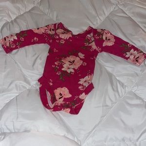 Long sleeved onesies 0-3 Month in size.